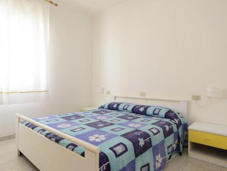 Villetta con 2 camere da letto e giardino a Lignano Pineta