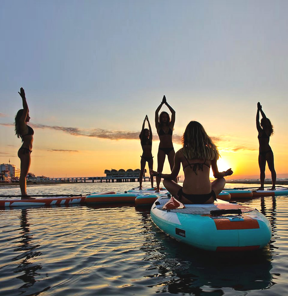 Sport sull’acqua e yoga vicino al mare a Lignano Sabbiadoro
